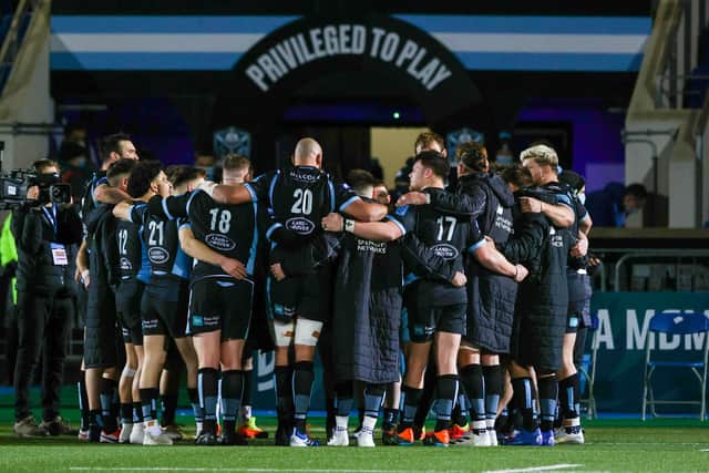 Glasgow Warriors in their post-match huddle following the win over Dragons. (Photo by Craig Williamson / SNS Group)