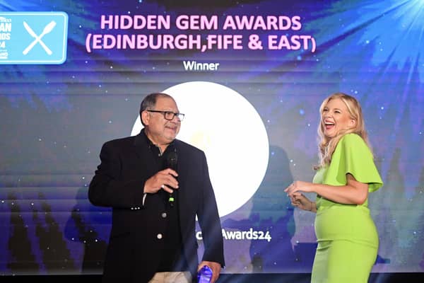 Luis Letelier-Lobos accepts the 'Hidden Gem' award on behalf on Midlothian curry house The Radhuni from event host Katy Johnston.