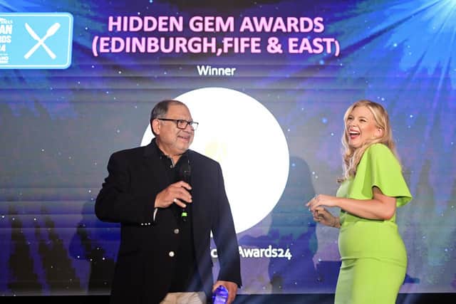 Luis Letelier-Lobos accepts the 'Hidden Gem' award on behalf on Midlothian curry house The Radhuni from event host Katy Johnston.