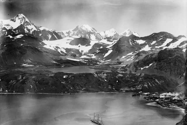 King Edward Cove and resevoir from the slopes of Mount Duse, with RRS Discovery in the foreground, in South Georgia in 1925.