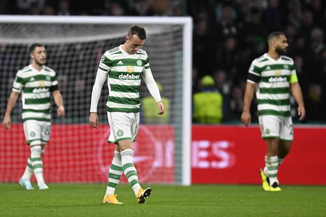 The Celtic players trudge off after the 2-0 home defeat by RB Leipzig.