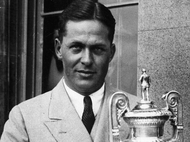 American golfing legend Bobby Jones with the British Amateur Championship golf trophy at St Andrews in 1930.