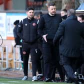 Dundee United manager Tam Courts (left) congratulates Celtic manager Ange Postecoglou after the visitors' 3-0 win at Tannadice (Photo by Craig Williamson / SNS Group)