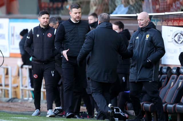 Dundee United manager Tam Courts (left) congratulates Celtic manager Ange Postecoglou after the visitors' 3-0 win at Tannadice (Photo by Craig Williamson / SNS Group)