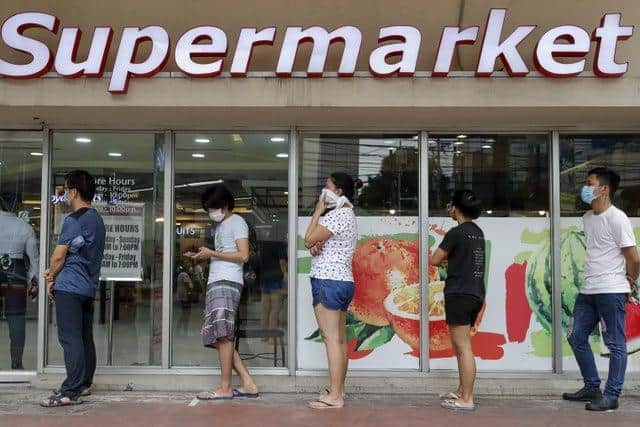 Long queues outside supermarkets were a feature of early lockdown in Scotland.