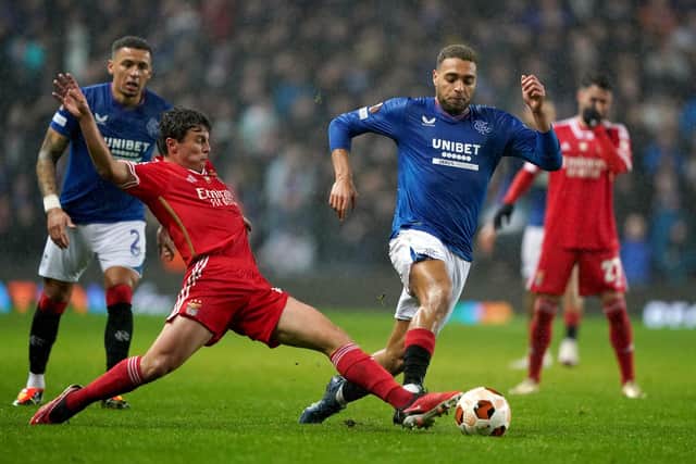 Rangers' Cyriel Dessers tries to spark an attack during the match against Benfica.