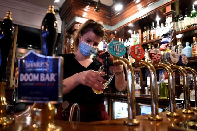 Pubs are important parts of their communities and need help to survive the Covid outbreak (Picture: Daniel Leal-Olivas/AFP via Getty Images)