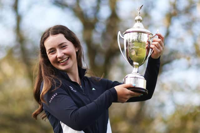 Grace Crawford shows off the trophy after winning the R&A Girls Under-16 Amateur Championship at Enville Golf Club in Stourbridge. Picture: Naomi Baker/R&A/R&A via Getty Images.