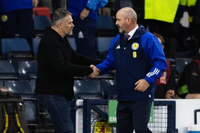 Scotland boss Steve Clarke shakes the hand of his counterpart Willy Sagnol after the 2-0 win over Georgia at Hampden.