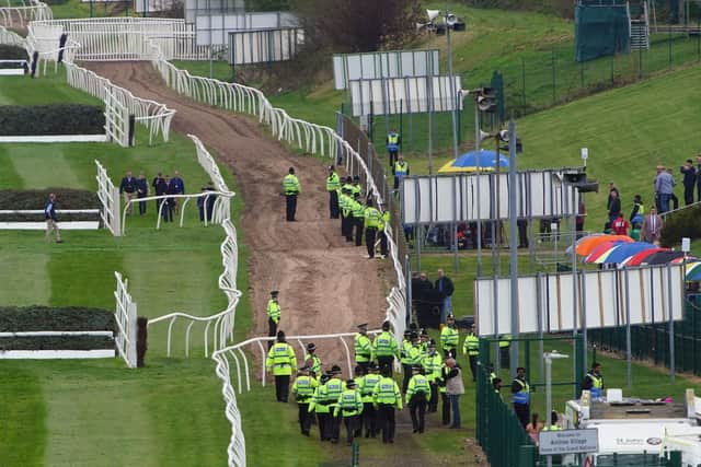 A significant police presence was in place ahead of day three of the Randox Grand National Festival at Aintree Racecourse, Liverpool, with three arrests made linked to a threat of "co-ordinated disruption". PIC: PA/ The Jockey Club/Aintree Racecourse.