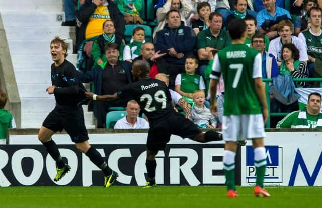 Emil Forsberg (left) celebrates with Tokelo Rantie after scoring against Hibs (Picture: SNS Group Craig Williamson)