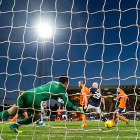 Craig Wighton's late winner makes it 2-1 to Dundee at Dens on the night Dundee United were relegated. Dundee have since won only 30 out of 100 home league games
