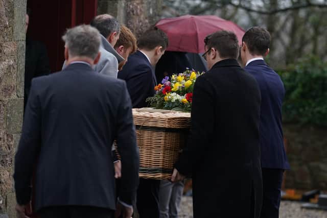 Pall bearers carry the casket at the funeral of TV presenter and journalist Nick Sheridan, at St Ibar's Church in Castlebridge, Co Wexford. Picture: Brian Lawless/PA Wire