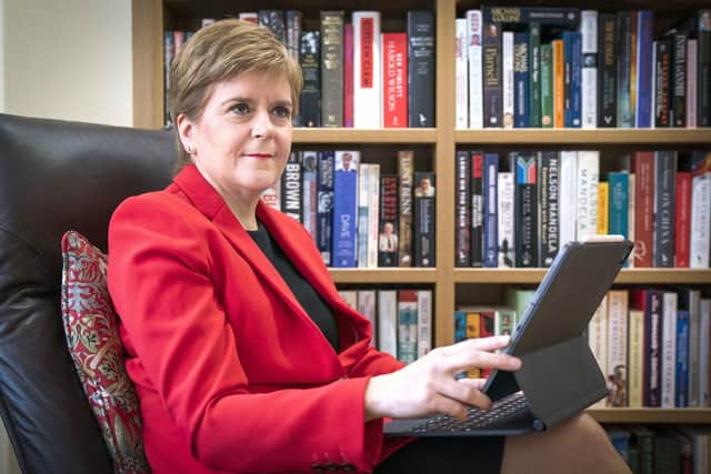 First Minister Nicola Sturgeon at her home in Glasgow preparing her speech.