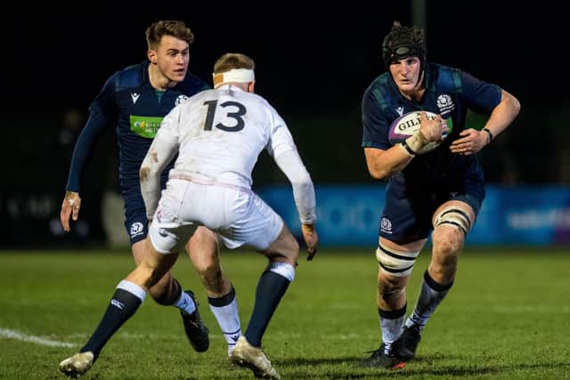Scotland's Cameron Henderson (right) on the attack against England during an U20 Guinness Six Nations match at Myreside. (Photo by Ross Parker / SNS Group / SRU)
