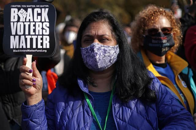 Activists take part in a voting rights protest outside the White House (Picture: Alex Wong/Getty Images)