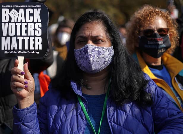 Activists take part in a voting rights protest outside the White House (Picture: Alex Wong/Getty Images)