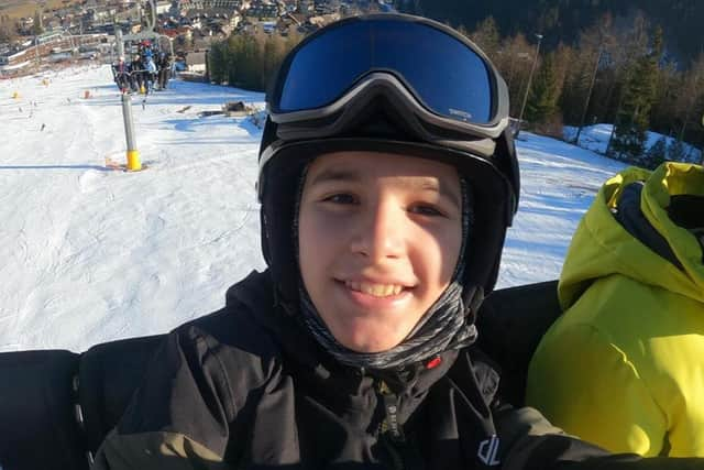 Filip Cegar, 14, who broke his back in a sledging accident, returns to the slopes on a snowboarding trip after raising money for the hospital that cared for him. Photo: Family handout/Big Partnership/PA Wire