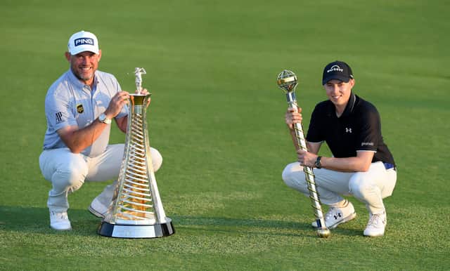 Lee Westwood with the Race to Dubai trophy and Matt Fitzpatrick with the Dubai Tour Championship trophy after the final round of the DP World Tour Championship at Jumeirah Golf Estates. Picture: Ross Kinnaird/Getty Images