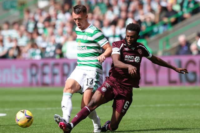 Celtic's David Turnbull is challenged by Hearts' Beni Baningime during the recent Premier Sports Cup match at Celtic Park. (Photo by Craig Williamson / SNS Group)