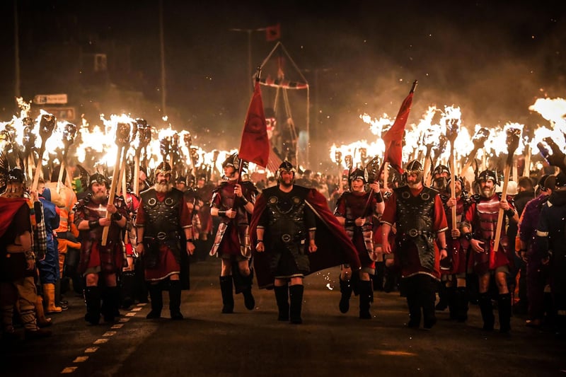 Up Helly Aa celebrates the influence of the Scandinavian Vikings in the Shetland Islands and culminates with up to 1,000 'guizers' (men in costume) throwing flaming torches into their Viking longboat and setting it alight later in the evening. Photo by Andy Buchanan / AFP