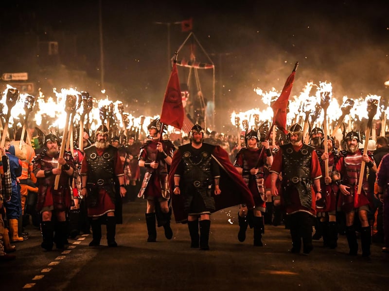Up Helly Aa celebrates the influence of the Scandinavian Vikings in the Shetland Islands and culminates with up to 1,000 'guizers' (men in costume) throwing flaming torches into their Viking longboat and setting it alight later in the evening. Photo by Andy Buchanan / AFP