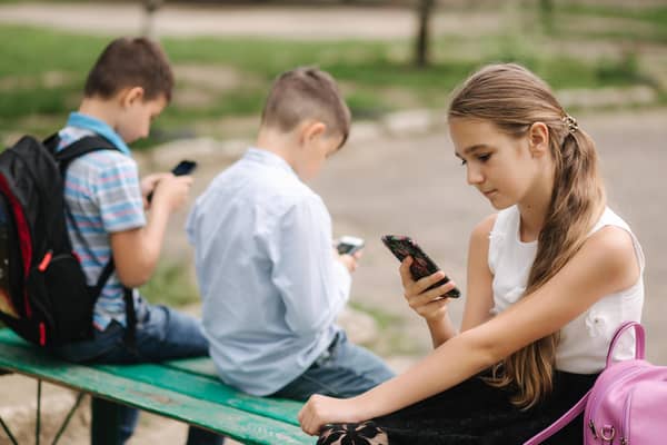 There is growing debate around restrictions on mobile phone use in schools. Picture: PA