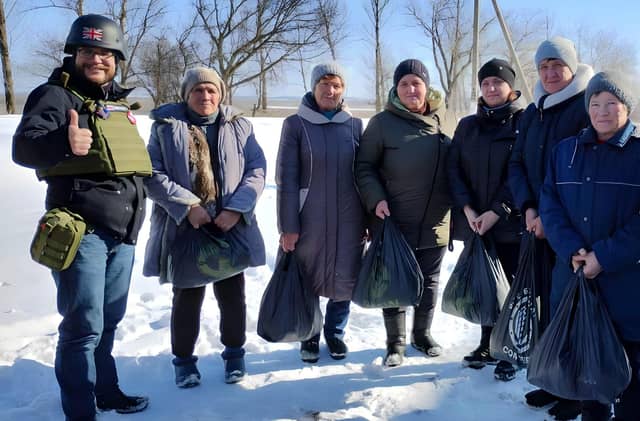 Oleg Dmitriev, of Sunflower Scotland, delivering aid to Novooleksandrivka village near Vovchansk in February last year.