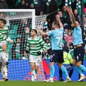 Dundee claim for a penalty after the ball hits Celtic's Jota (centre) on the arm during a Cinch Premiership match between Celtic and Dundee at Celtic Park, on February 20, 2022, in Glasgow, Scotland. (Photo by Craig Williamson / SNS Group)