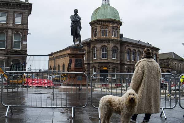 The newly restored Burns statue reinstated in Leith. Picture: Lisa Ferguson





Newly restored Burns statue reinstated in Leith as nation celebrates Scotlandâ€™s bard



An event will be held to mark the reinstatement of the 124-year old bronze statue, which was removed in 2019 to allow for Trams to Newhaven works. Elected members, conservationists and project team directors will hear a reading by former Edinburgh Makar Alan Spence of poems specially written for a time capsule placed under the statue,. This includes his own poem, Interesting Times.

ouncil Leader, Adam McVey; Depute Leader, Cammy Day; Transport and Environment Convener, Councillor Lesley Macinnes; Transport and Environment Vice Convener, Councillor Karen Doran; City of Edinburgh Archaeologist, John Lawson; Conservationist Nic Boyes; former Edinburgh Makar Alan Spence.



LATEST NEWS: Newly restored Burns statue unveiled in Leith



Leithâ€™s iconic Burns statue has been returned to its home on Bernard Street, as Scotland prepares to celebrate the national bard.



The 19th century bronze sculpture was put into storage in December 2019 to make way for Trams to Newhaven construction. It has since undergone specialist conservation work before its reinstatement at Bernard Streetâ€™s junction with Constitution Street.



On the morning of Burns Night (Tuesday, 25 January), Council leaders, tram project officers and contractors were joined by conservationists and former Edinburgh Makar Alan Spence to officially unveil the monument. They also marked the placement of a new time capsule underneath the statue, alongside an original capsule discovered in 2019, which contained relics from both the late 19th century and the 1960s.