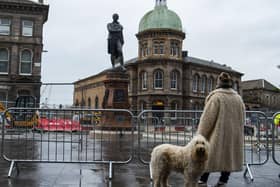 The newly restored Burns statue reinstated in Leith. Picture: Lisa Ferguson





Newly restored Burns statue reinstated in Leith as nation celebrates Scotlandâ€™s bard



An event will be held to mark the reinstatement of the 124-year old bronze statue, which was removed in 2019 to allow for Trams to Newhaven works. Elected members, conservationists and project team directors will hear a reading by former Edinburgh Makar Alan Spence of poems specially written for a time capsule placed under the statue,. This includes his own poem, Interesting Times.

ouncil Leader, Adam McVey; Depute Leader, Cammy Day; Transport and Environment Convener, Councillor Lesley Macinnes; Transport and Environment Vice Convener, Councillor Karen Doran; City of Edinburgh Archaeologist, John Lawson; Conservationist Nic Boyes; former Edinburgh Makar Alan Spence.



LATEST NEWS: Newly restored Burns statue unveiled in Leith



Leithâ€™s iconic Burns statue has been returned to its home on Bernard Street, as Scotland prepares to celebrate the national bard.



The 19th century bronze sculpture was put into storage in December 2019 to make way for Trams to Newhaven construction. It has since undergone specialist conservation work before its reinstatement at Bernard Streetâ€™s junction with Constitution Street.



On the morning of Burns Night (Tuesday, 25 January), Council leaders, tram project officers and contractors were joined by conservationists and former Edinburgh Makar Alan Spence to officially unveil the monument. They also marked the placement of a new time capsule underneath the statue, alongside an original capsule discovered in 2019, which contained relics from both the late 19th century and the 1960s.