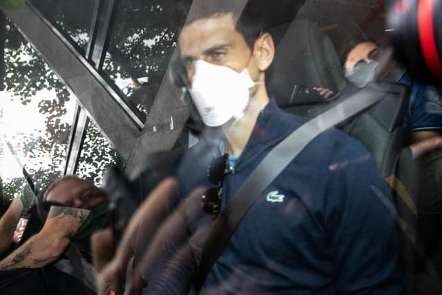 Novak Djokovic leaves the Park Hotel on his way to his appeal hearing after his visa was cancelled by the Australian government. His appeal was rejected and he is to be deported. (Photo by Diego Fedele/Getty Images)