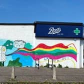 The colourful mural in Cardonald replaced racist graffiti with a more hopeful, positive message: 'Racism's kind of *****, isn't it?' on Saturday evening.