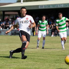Aberdeen's Christian Ramirez scores a penalty to make it 1-1 during a pre-season friendly against Buckie Thistle.