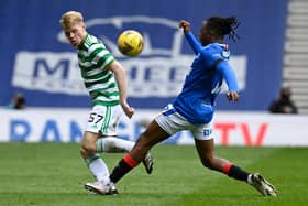 Celtic's Stephen Welsh (left) is tackled by Rangers' Joe Aribo during a Scottish Cup at Ibrox last weekend. Alan Stubbs believe the two clubs are brands that would attract major investment if they played in a British league. (Photo by Rob Casey / SNS Group)
