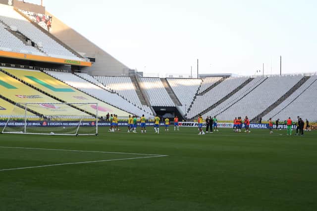 The Brazil players have a training session after the match was interrupted.
