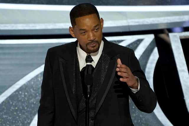 Will Smith cries as he accepts the award for best performance by an actor in a leading role for "King Richard" at the Oscars on Sunday, March 27, 2022, at the Dolby Theatre in Los Angeles. (Image credit: AP Photo/Chris Pizzello)