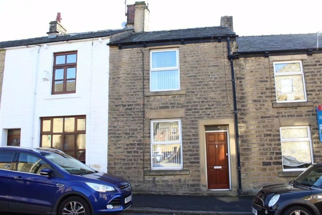 Another property in Glossop, this terraced house is valued at £135,000.