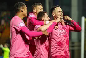 Lawrence Shankland, right, could return to the Hearts starting XI against Dundee.