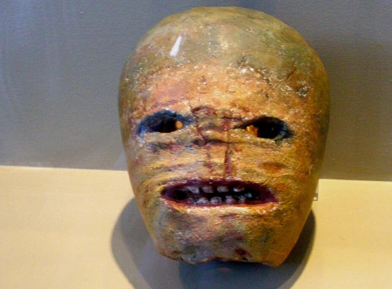 This is a carved turnip on display at the Museum of Country Life in Ireland, it is a historical example of how locals would carve turnips to resemble scary faces during Halloween.
