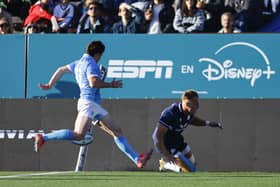 Duhan Van Der Merwe scores his record-setting 28th try for Scotland in Uruguay.