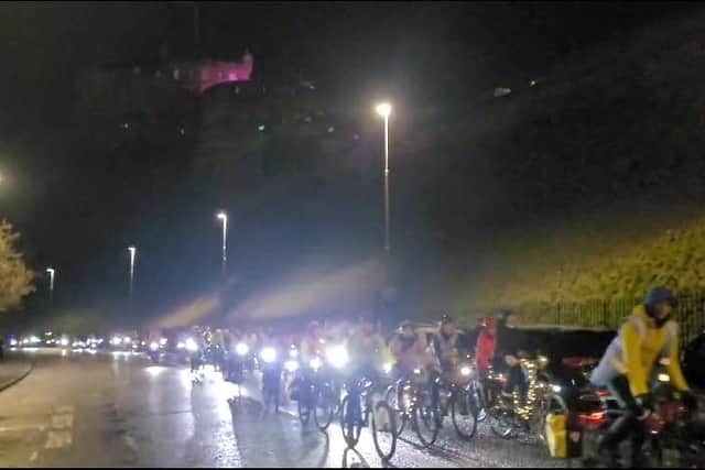 Riders ascending Johnston Terrace past Edinburgh Castle. (Photo by InfraSisters)