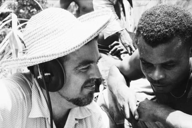 Alan Lomax and singer Raphael Hurtault listening to playback in Dominica in 1962. PIC: From the Alan Lomax Collection at the American Folklife Center, Library of Congress. Courtesy of the Association for Cultural Equity