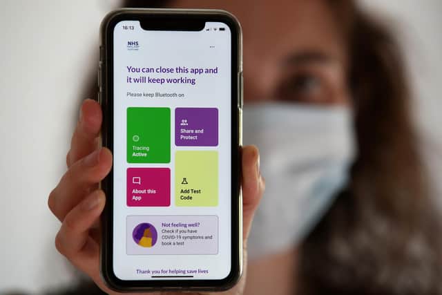 The Protect Scotland app alerts people if they have been near someone who also has the app and who has tested positive for Covid (Picture: Andrew Milligan/PA)