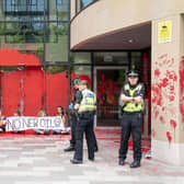 Campaigners demonstrating at Queen Elizabeth House in Edinburgh. JANE BARLOW/PA