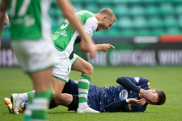 Hibs' Ryan Porteous and Kilmarnock's Kyle Lafferty came together on more than one occasion.