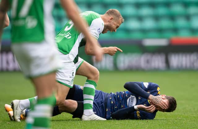 Hibs' Ryan Porteous and Kilmarnock's Kyle Lafferty came together on more than one occasion.