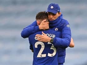 Thomas Tuchel and midfielder Billy Gilmour celebrate after the English Premier League match between Manchester City and Chelsea at the Etihad Stadium on May 8, 2021. Chelsea won the game 2-1. (Photo by LAURENCE GRIFFITHS/POOL/AFP via Getty Images