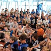 It's a nervous watch for the young members of Edinburgh Athletics Club at Meadowbank as local Josh Kerr runs in the 1500m Olympic final.