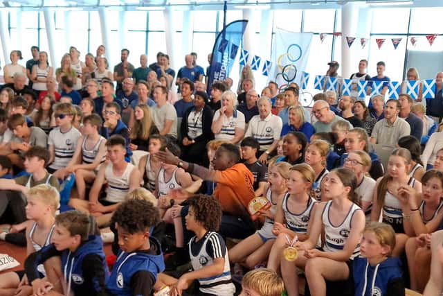 It's a nervous watch for the young members of Edinburgh Athletics Club at Meadowbank as local Josh Kerr runs in the 1500m Olympic final.